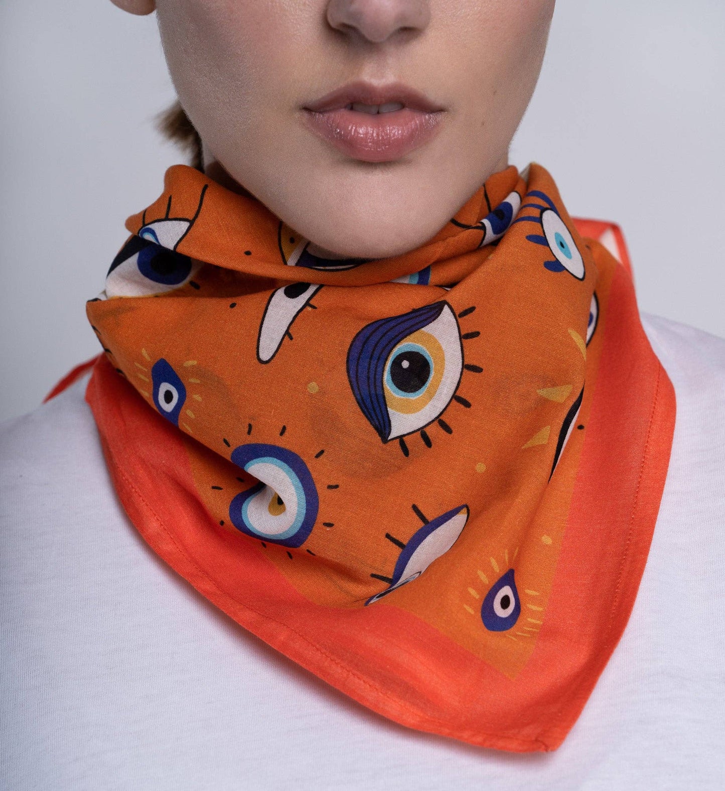 KORES ACCESSORIES - Oranje bandana met boze oog